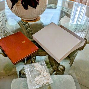 ITALIAN LEATHER PHOTO ALBUM. with acid free paper, photo corners and box.